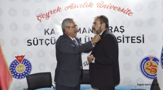 REKTÖR DEVECİ'DEN MAHİR ÜNAL'A ROZET..