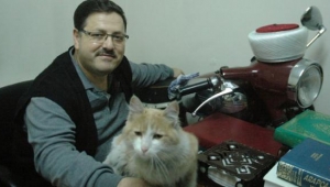 İMAM, MOTORSİKLET VE KEDİSİ...