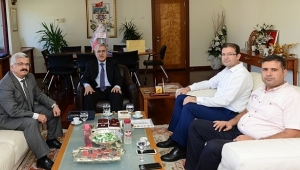 PTT BAŞMÜDÜRÜ KAPLAN, REKTÖR CAN’I ZİYARET ETTİ