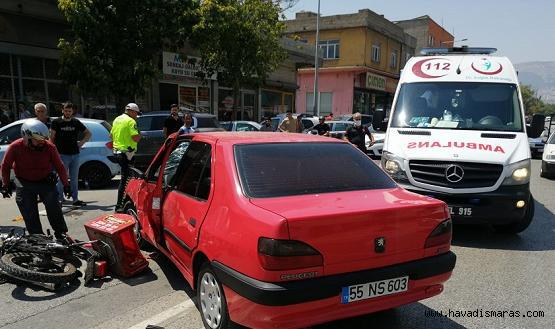 Otomobille çarpışan motosiklet sürücüsü yaralandı..