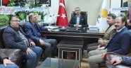 BAŞKANLARA HAYIRLI OLSUN DEDİ.