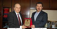 TÜFAD’DAN ARIKAN’A PLAKET...